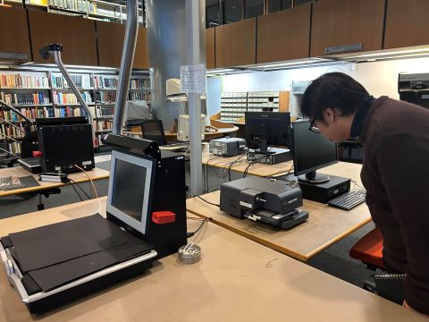 Some of the IISH's library workstations, which include a film reader and scanner.   Photo Credit: My Hang Thi Bui